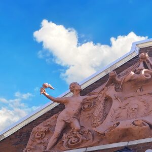 South Side Turnverein final relief sculpture recreation on building. Photo Credit: Mary Beth Mullens