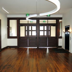 Inside view of front doors after renovation. Photo Credit: Ratio Architects